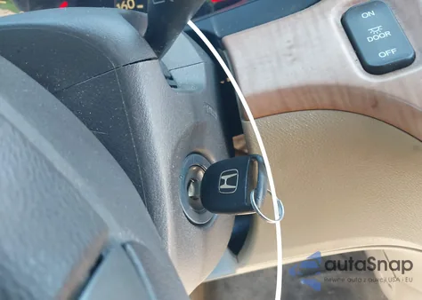 2010 Honda Odyssey Ex-L z USA, uszkodzony, nr VIN 5FNRL3H65AB007439